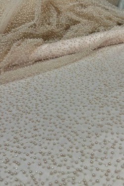 tulle embroidered with...